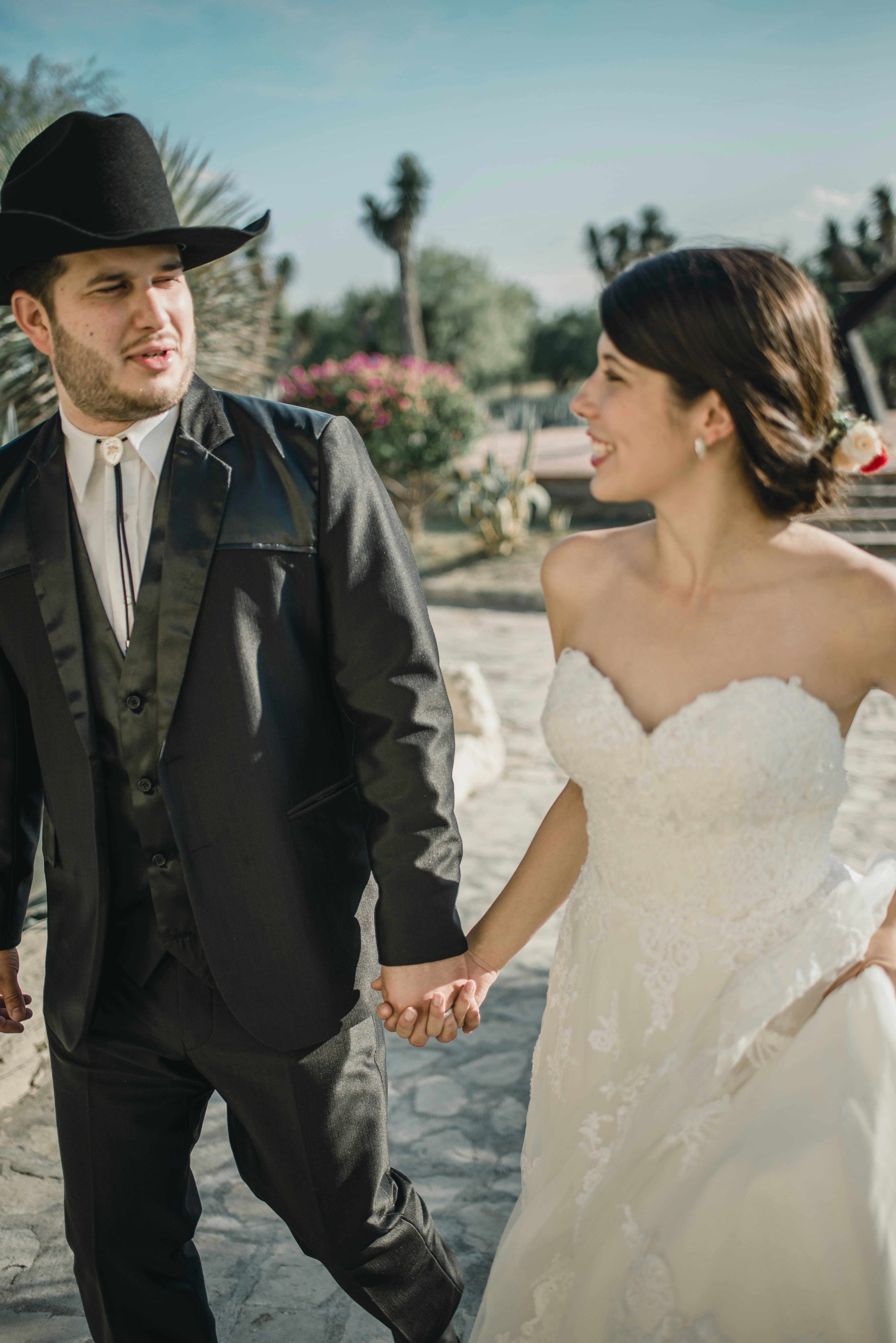 woman and man holding hands